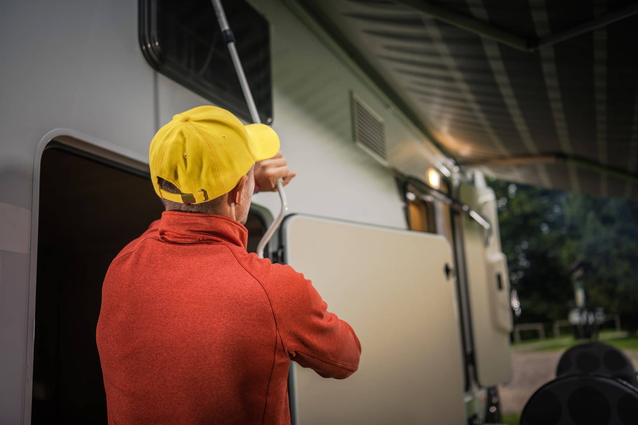 Modern Camper Van Recreational Vehicle Motorhome Awning Extending by Camper.