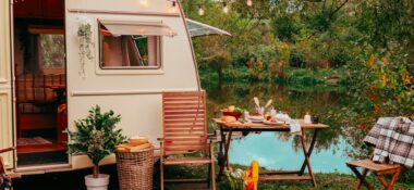 A travel trailer camp is set up and full of all the amenities needed for a fun camping weekend.