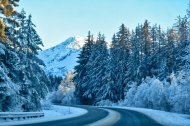 View of a snowy road in Alaska, one of the coldest states in the US