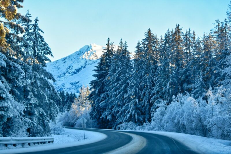 View of a snowy road in Alaska, one of the coldest states in the US