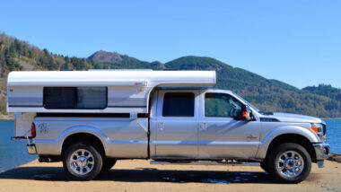 An Alaskan Camper attached to a truck