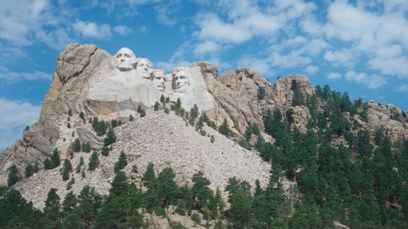 A view of mount rushmore, where many are convinced there is a hidden face