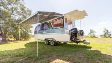 A CaraBoat camper boat set up as a camper on land