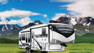 A coachmen chaparral parked outside