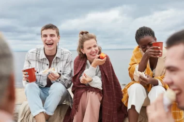 Friends at Beach Party by Lake