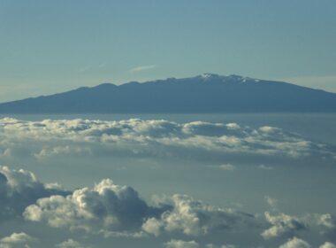 Haleakala National Park, Maui, Hawaii with clouds surrounding it.