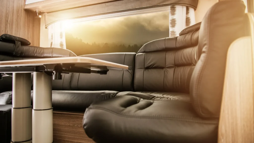 A plush leaether dinette in an RV. Emphasizing the importance of amenities in your RV. 