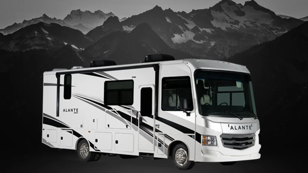 The exterior of the Jayco Alante 27A as it sitsin front of a black and grey mountain range. 
