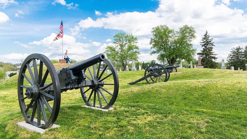 Doubleday Hill - Civil War's national monument in Williamsburg, Maryland. There are two cannons set beside a graveyard.