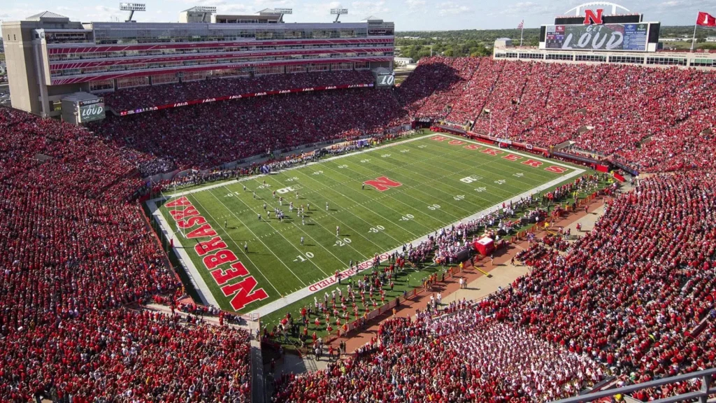 The Cornhusker Stadium, Memorial Stadium, at the University of Nebraska. It's filled with people in red as we look down at the field.